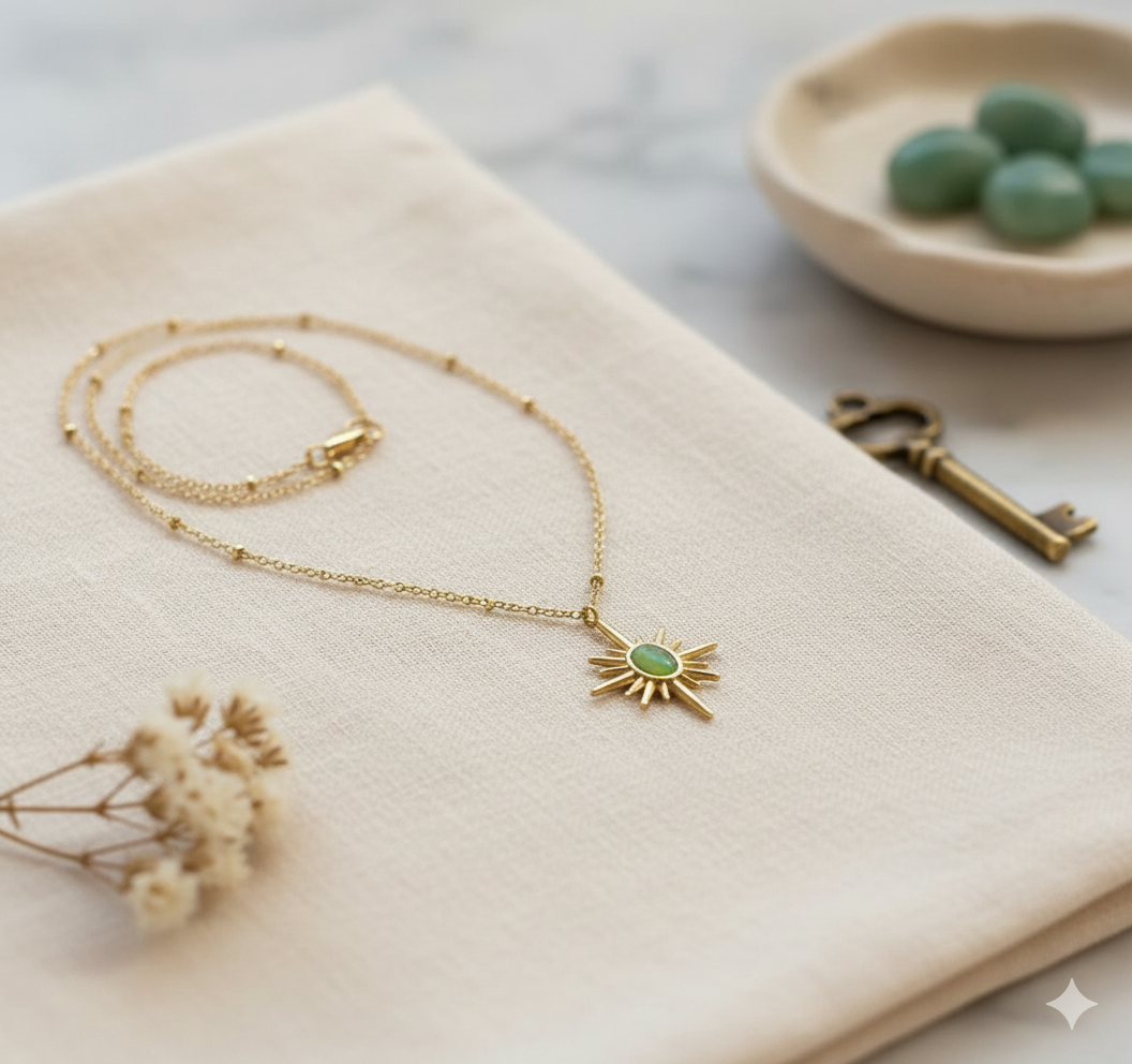 Gold Sunburst Pendant Necklace with Green Stone