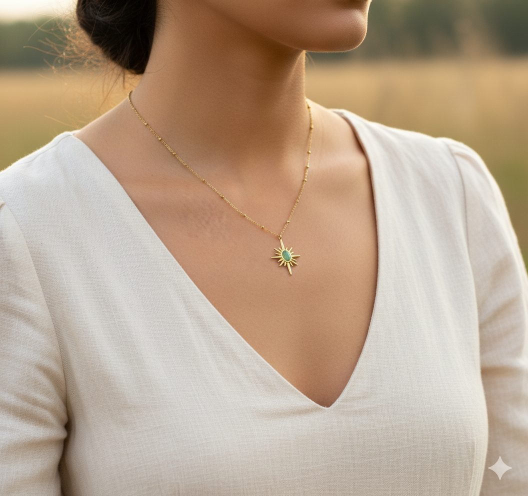 Gold Sunburst Pendant Necklace with Green Stone