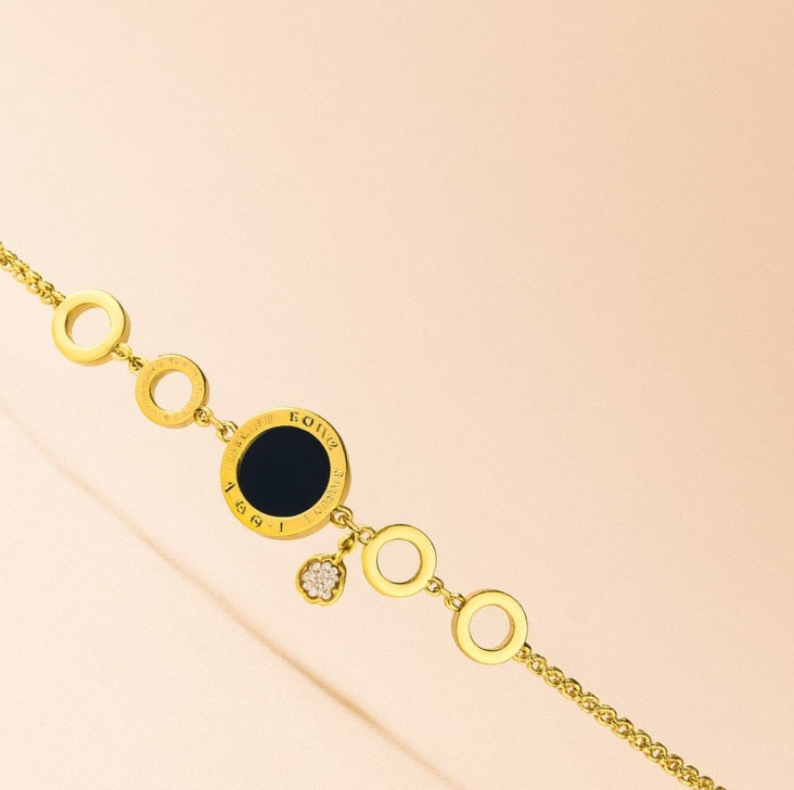 1. Gold Circle Link Bracelet with Black Enamel & Charm
